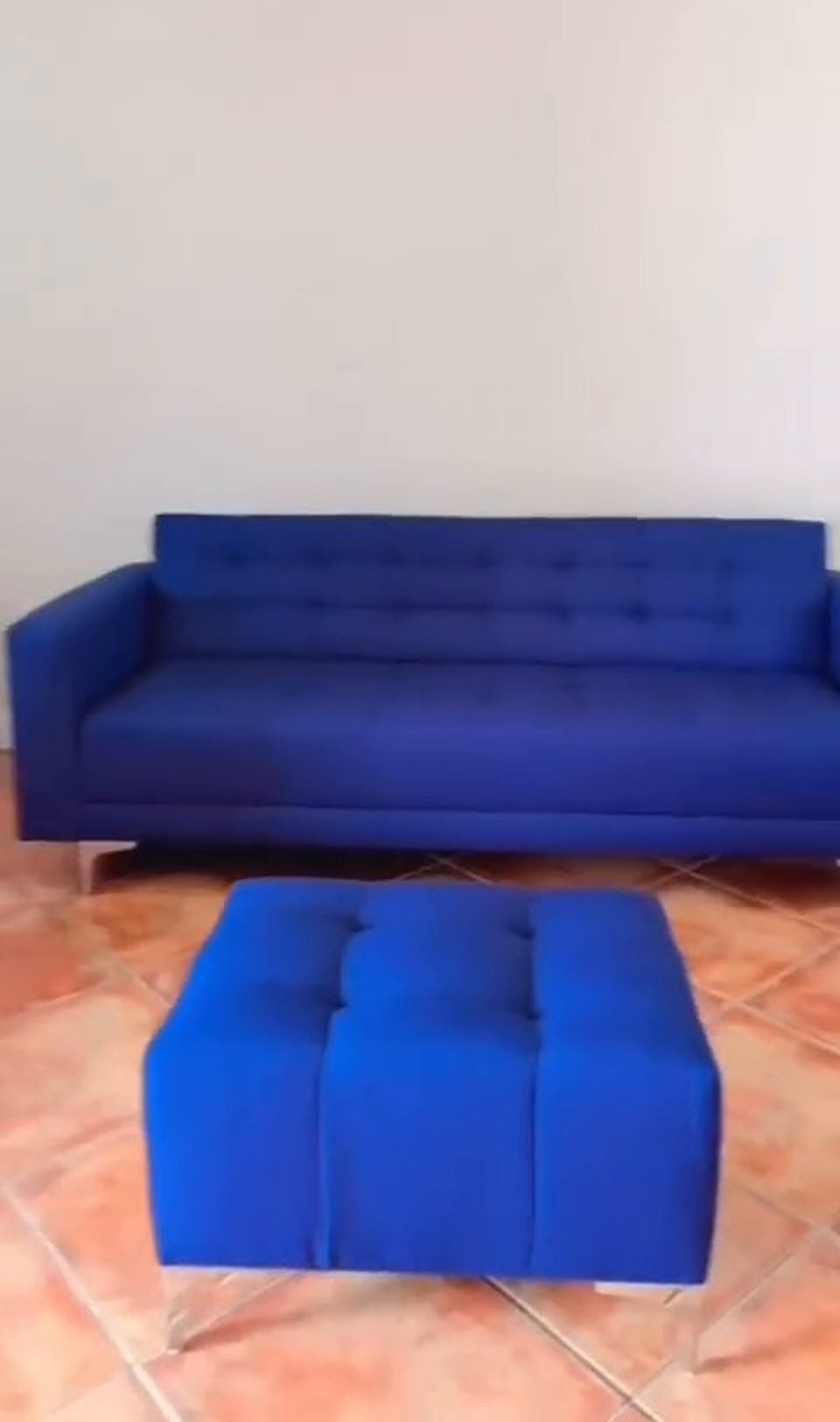 Living room with a blue sofa